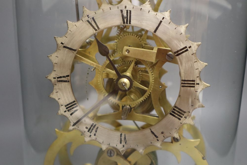 A 19th century brass skeleton clock, with fusee and in-line train, under glass dome, with key and pendulum, height 41cm